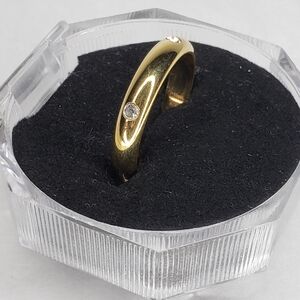 Elegant Gold Tone Ring with Diamond Accent